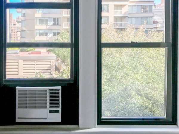 soundproof window air conditioner with insulation surrounding unit